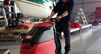 ASC 18 Inch Walk Behind Floor Scrubber Ensures Spotless Conditions of The Aviation Hangar